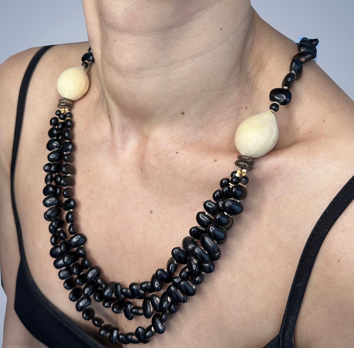 Necklace with black mucuma seed, 3 loops