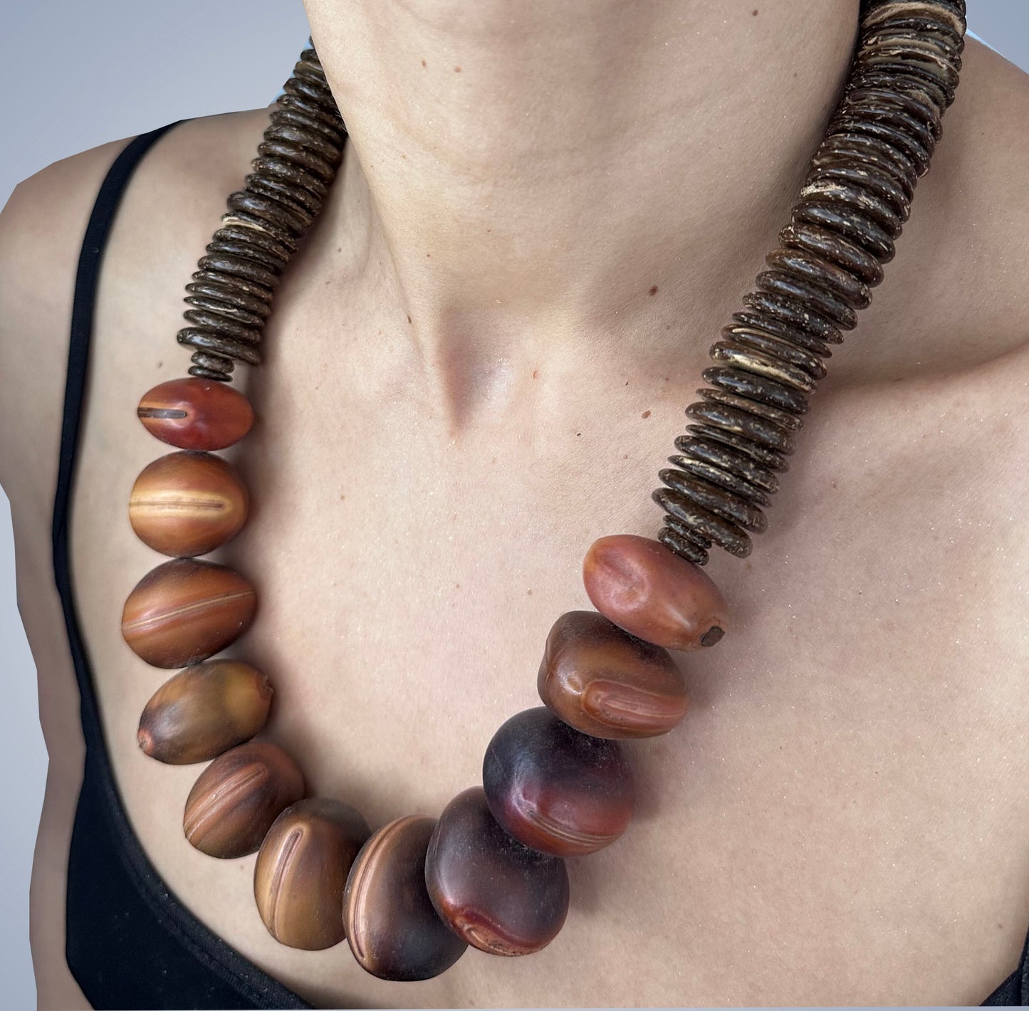 Bull's eye seed and coconut shell necklace