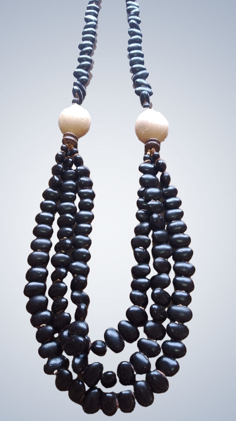 Necklace with black mucuma seed, 3 loops