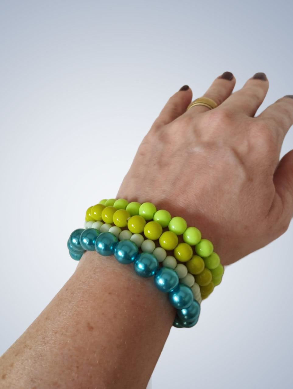 Mix de 4 pulseiras em tons de verde